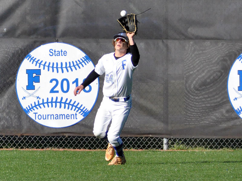 Jason Pearson snags a fly ball in recent action for the Fannin County Rebels.