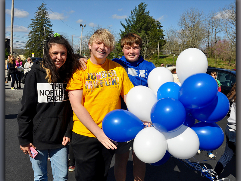 In memory of Shane Adrian “Dewey” Derreberry, friends Abby Ridings, Logan Sosebee and Baylor Twiggs, from left, attended a special balloon release Thursday, April 1.