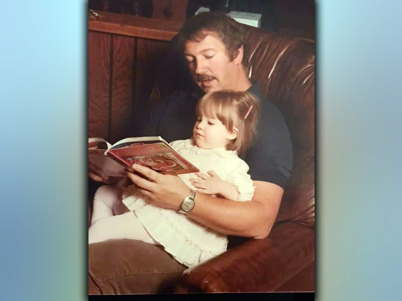 Sarah Welch credits a lot of her success in education and life to growing up as a Fannin County native with top-notch community members and educators like her father, Mike Ballew, who is shown reading with her as a young child.