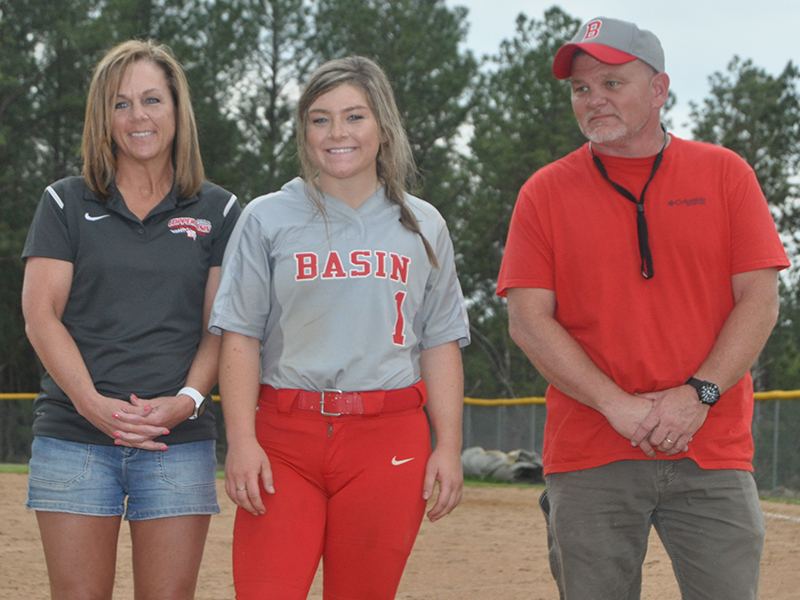Kaitlyn Goode was honored after the Lady Cougars' softball game with Lookout Valley Thursday, April 29. Goode is shown with her parents David and Amy Goode.