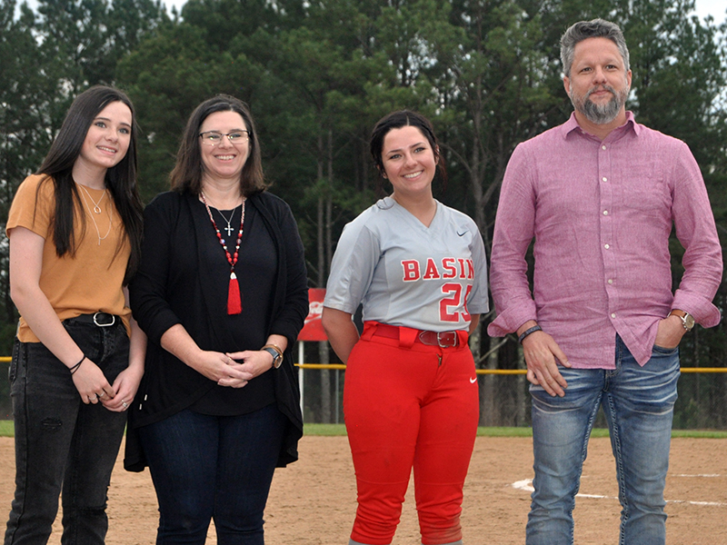 The Copper Basin Lady Cougars softball team honored their seniors Thursday, April 29, after their game against Lookout Valley. Shown during the ceremony are, from left, sister,  Emily Mundy; mother, Jenny Mundy; senior, Bailey Mundy; and father, Brian Mundy.