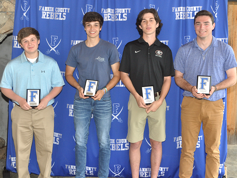 The Rebel baseball team awarded four academic awards, one per grade level, Monday, May 17, at their awards banquet at the Ridge Community Church pavilion. Shown are, from left, freshman Connor Johnson, sophomore Hayden Danner, junior Cater Johnson and senior Brady Martin.