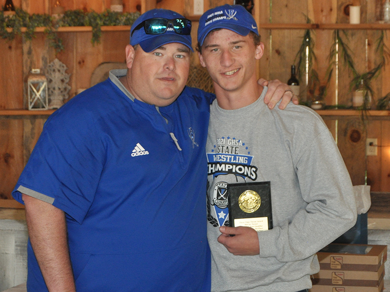 McCay Turner also received the Three-Time Threat Award for placing three years in the State Tournament during his high school career. The award was presented at the Rebels wrestling banquet Thursday, May 6. Turner is shown with Head Coach Chuck Patterson