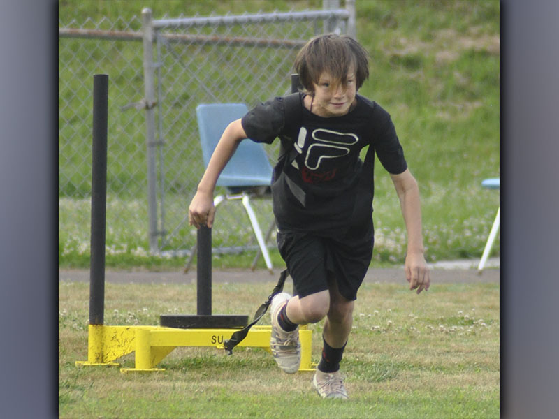 Cougar Easton Manuel completes a drill during the Cougars’ football practice Thursday, June 10.