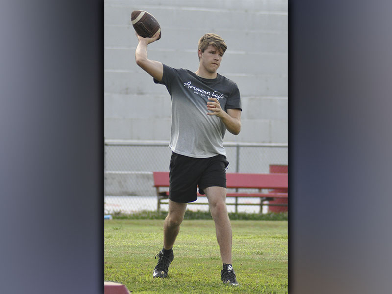 Copper Basin quarterback Joe Boggs throws a dart to a receiver during the Cougars’ Summer workout Thursday, June 10.