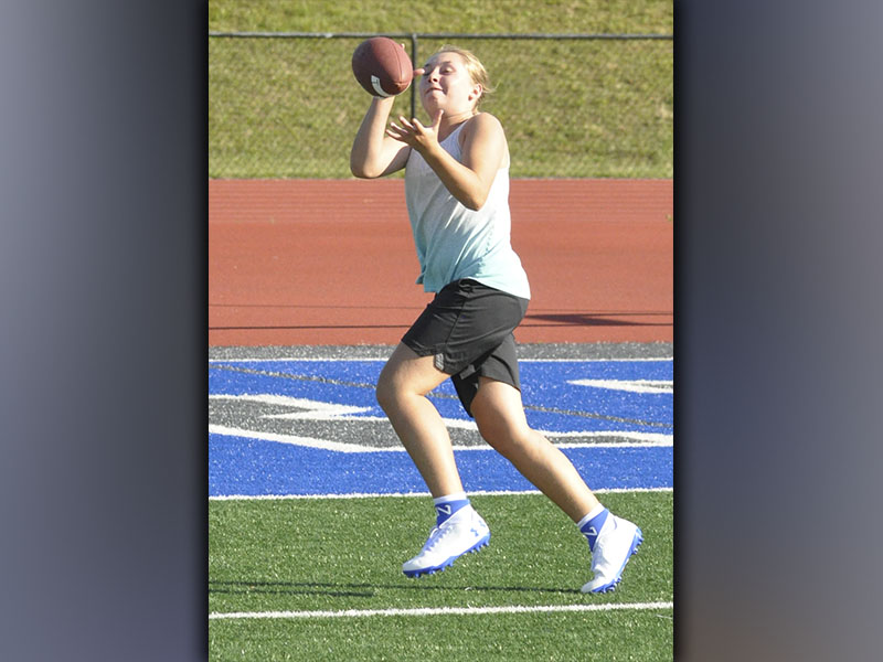 Venice Oliver hauls in a catch during football camp at the Fannin County High School football stadium Wednesday, June 16.