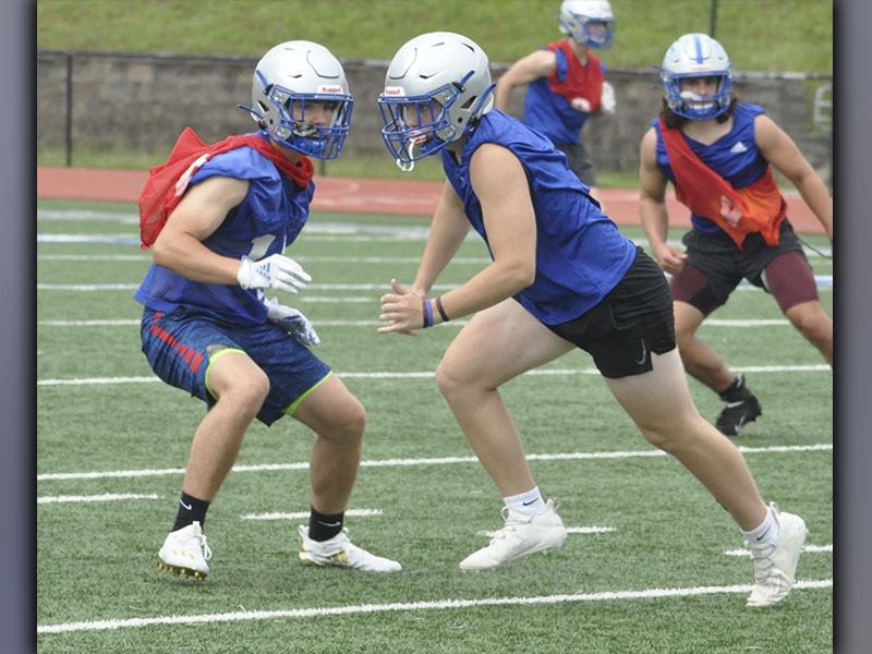 Cade Sands, left, covers Justin Pearson’s route during the Fannin Rebels’ football practice Wednesday, June 9. 
