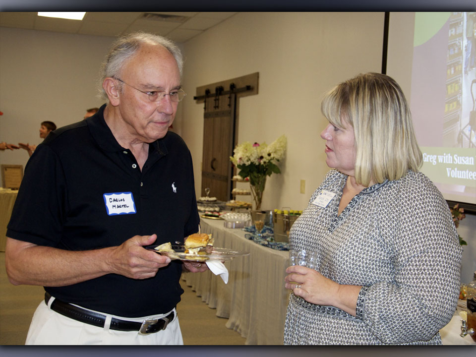 Carlos Martel and Sandy Ott enjoy conversation over hors d’oeuvres during Fannin County Chamber of Commerce’s Business After Hours at Fannin County Family Connection.