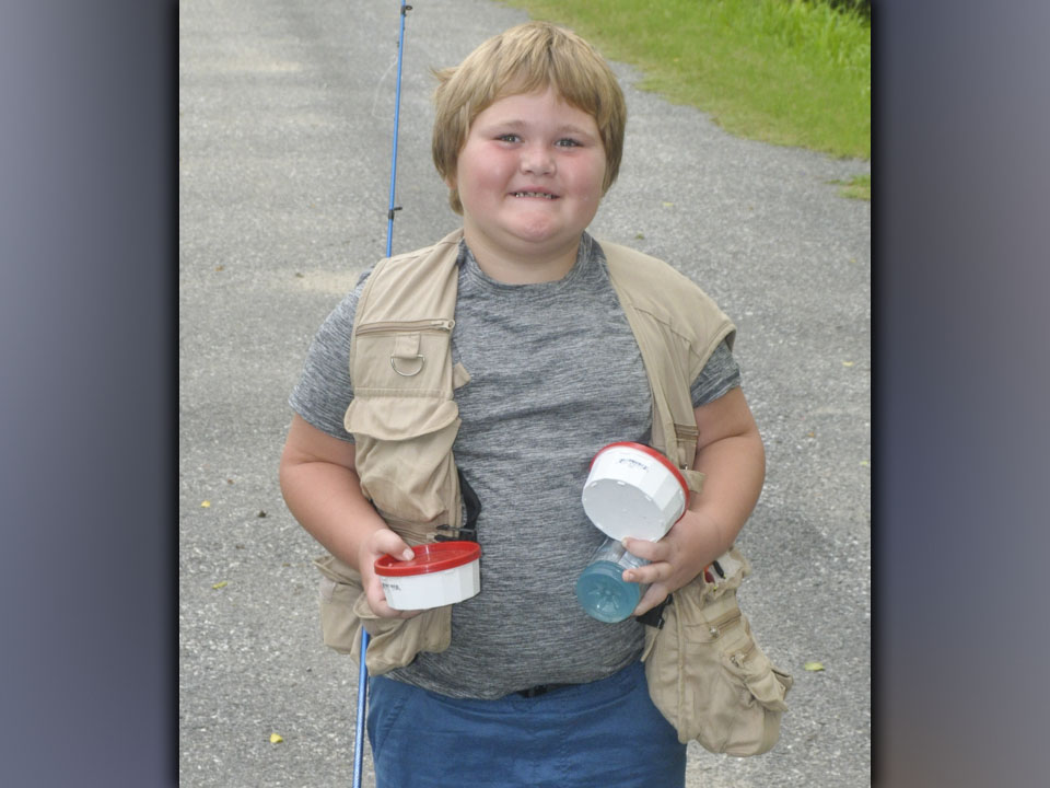 Mason Ross was ready to go fishing during the fishing camp hosted by the Fannin County Recreation Department Wednesday, July 28.