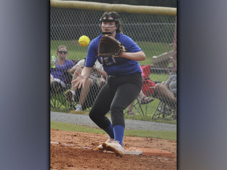 First baseman Rachel Adams catches a ball and gets a Gilmer runner out during the Lady Rebels preseason scrimmage against Gilmer County Thursday, August 5.