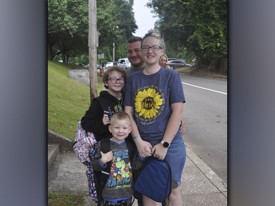 Shown being dropped off at the first day of school at Blue Ridge Elementary School Friday, July 30, are, clockwise, kindergartener Maclee Dillard, his sister fifth grader Keira Dillard, and parents Brett and Katie Dillard. 