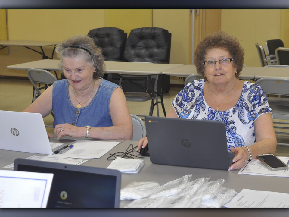 Beverly Whitmer, left, and Marieda Trammell keep working hard on their computer skills after completing the computer training at Copper Basin Community Center Friday, August 13. 