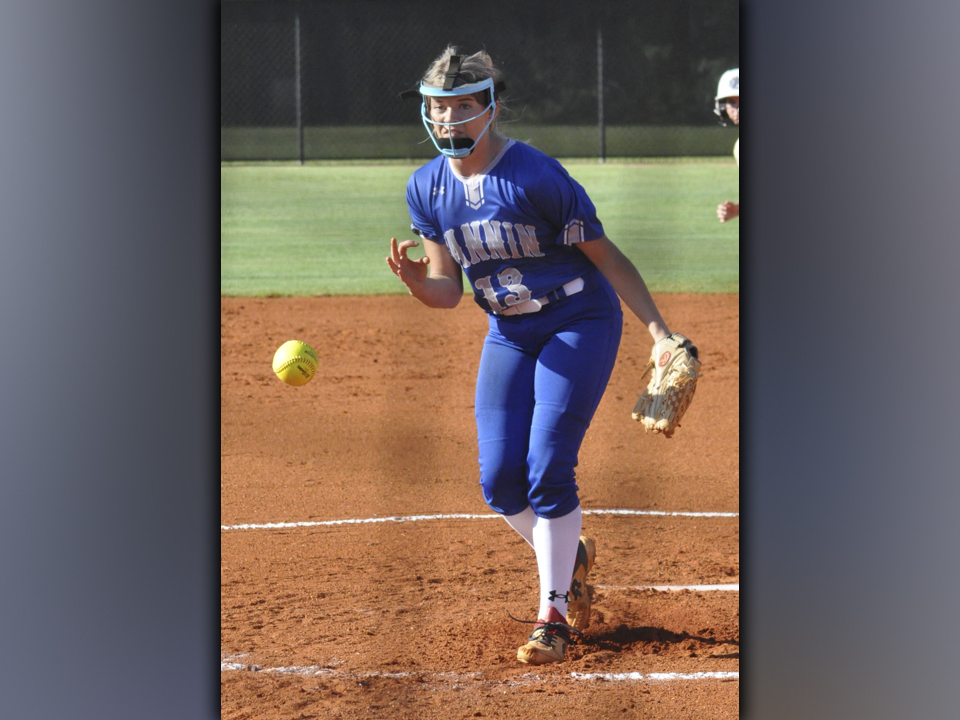 Josilynn Newton throws a strike during the Lady Rebels game against Union County Thursday, September 2. Newton had four strike-outs in the game.