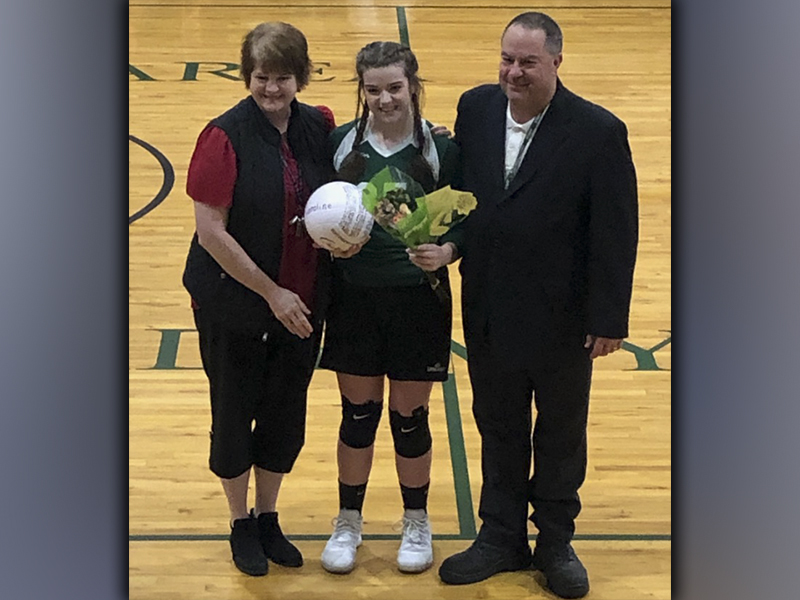 MACA volleyball seniors were recently honored during a Lady Lions volleyball game Thursday, September 23. Senior Caroline Scoggins was one of the three seniors honored and she is shown with her parents Chris and DeGina Scoggins.