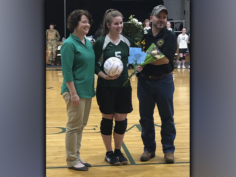 MACA recognized three seniors during the last home volleyball game of the season Thursday, September 23. Senior Emma Thomas is shown with her parents Andy and Laura Thomas.