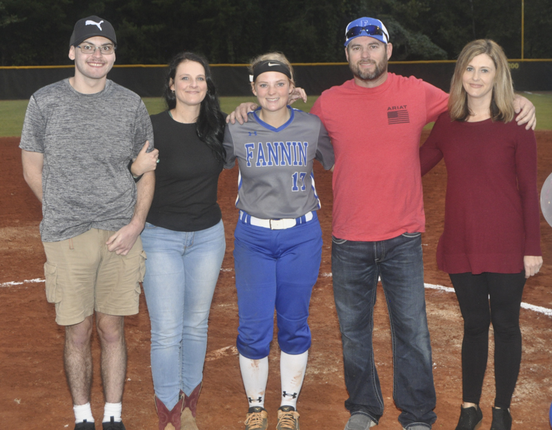 Riley Davis was one of three senior Lady Rebel softball players honored during the last home game of the season Tuesday, October 5. Shown are, from left, Tristen Davis, brother; Tanya Davis, mother; senior Davis; Vernon Davis, father; and Lanita Rogers.