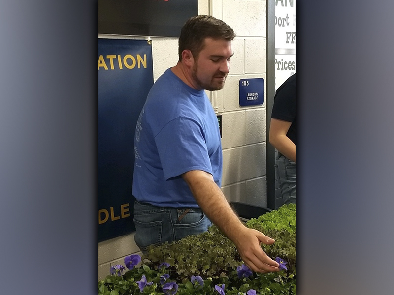 Seth Davis, Fannin County Middle School FFA advisor, helps educate patrons on these plants during the Annual Harvest Sale at the Fannin County School System Ag Facility the weekend of October 16.