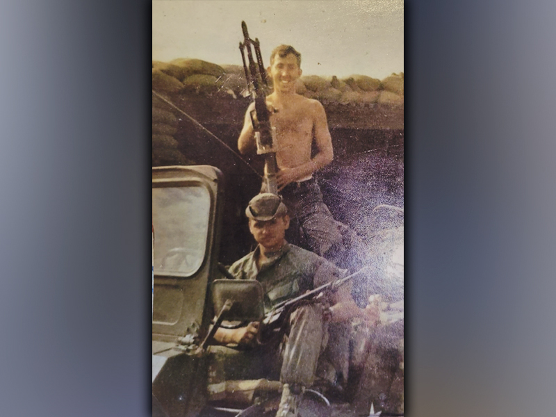 U.S. Army veteran Sonny Payne is shown shirtless while on tour in Vietnam. He said it was constantly hot and dry, which caused his hair to bleach out.