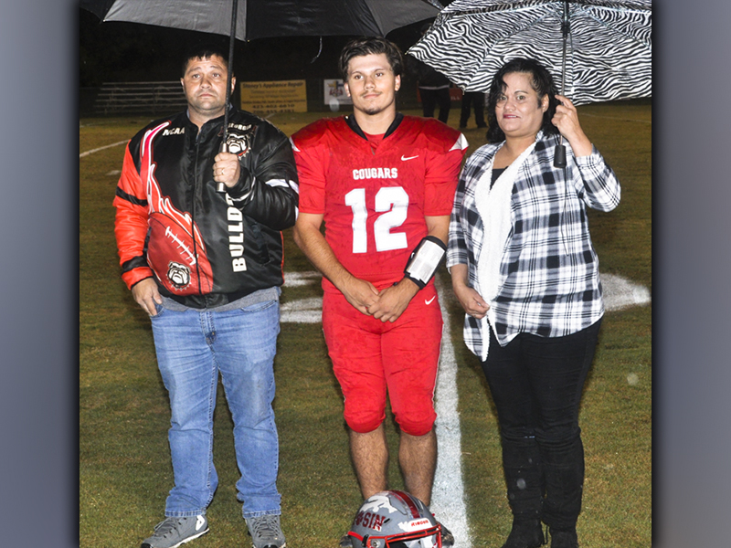 Copper Basin football senior Sebastian Baliles was recognized with the other football, band, cheer and golf seniors at Copper Basin’s senior night ceremony Friday, October 29. Baliles is shown with his parents Maribel Estramera and Aaron Baliles.