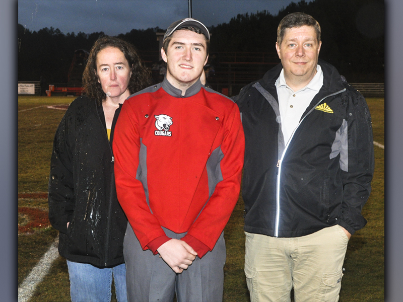 Copper Basin band senior Marshal Gourley was recognized Friday, October 29, before the Cougars last home football game of the season. Gourley is shown with his parents Clay and Connie Jo Gourley.