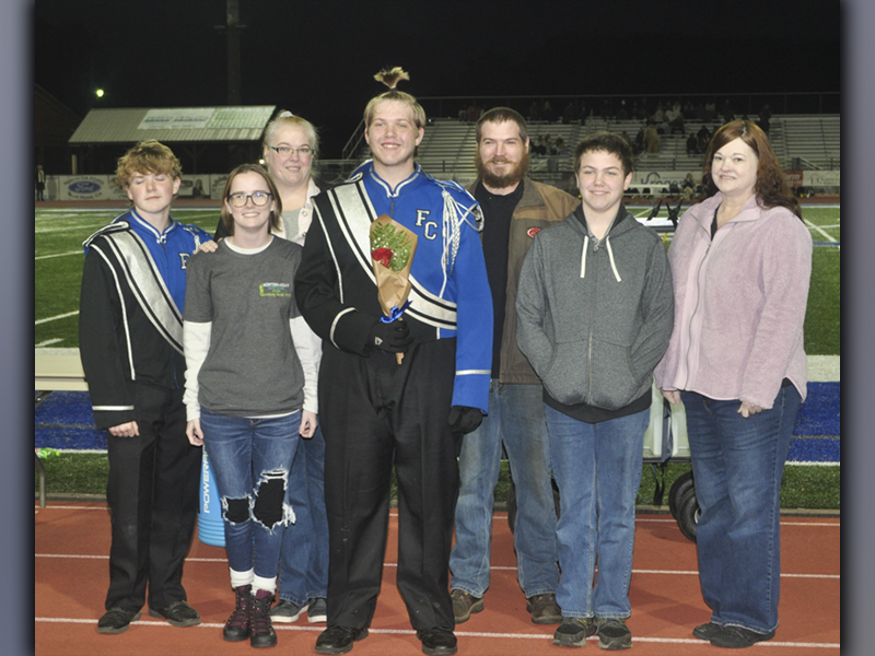 Ethan Jolly was recognized with the other band seniors during Fannin County High School’s senior night ceremony Friday, November 5. Among well wishers are, from left, Soren Jolly, Faith Watkins, Shana Knight, senior Ethan Jolly, Dustin Knight, Sean Knight and Tina Jolly.