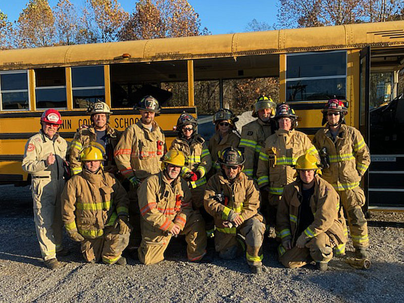 Among the group taking part in the school bus extrication class were, from left, standing, Starfire Training Systems Leigh Hollins , Deputy Fire Chief Rob Ross, Will Reed, Virginia Jones, Sharon Fox, Aaron Allen, Tanya Gregory, Michael Cornelius, and, front, Daniel Henderson, Jim Edelstein, John Calvert, and Michael Schuhle.