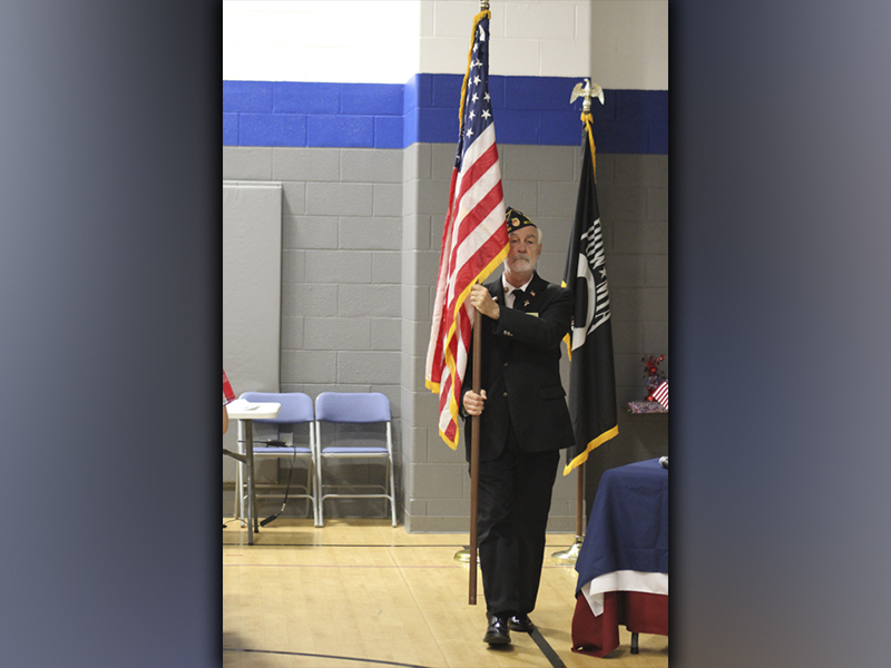 North Georgia Honor Guard member Steve Strickland proudly retires the Colors at the end of Blue Ridge Elementary School’s Veterans Day ceremony Wednesday, November 10.