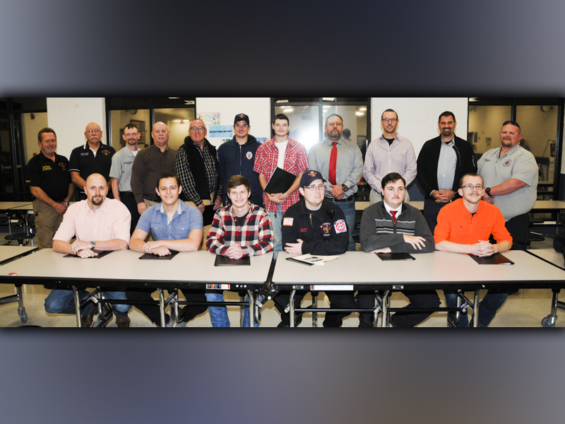 The Fannin County Fire Department recognized 13 new firefighters who successfully completed their National Professional Qualification (NPQ) 1 class. From left, seated, Will Reed, Jade Underwood, Kolton Stephens, John Sellers, Daniel Henderson, and Ryan Smith; and, standing, Fire Chief Larry Thomas, Assistant Fire Chief Rob Ross, Training Chief Michael Cornelius, James Edlestein, Mark Snoddy, Michael Schuhle, Gabriel Phillips, Chad Whitaker, Brett Crain, Steven Kirby, and South Battalion Chief Mathew Karry.