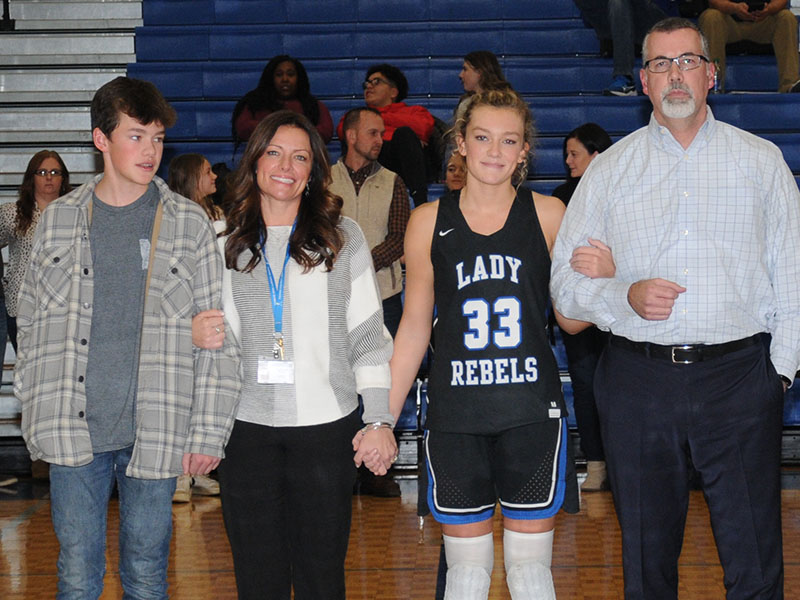 Reagan York, who has played for the Lady Rebels varsity for four years, was honored during Senior Night Friday, January 7, at the Fannin County High School gym. She is shown with her parents, Shannon and Richard York, and her brother, Hudson.