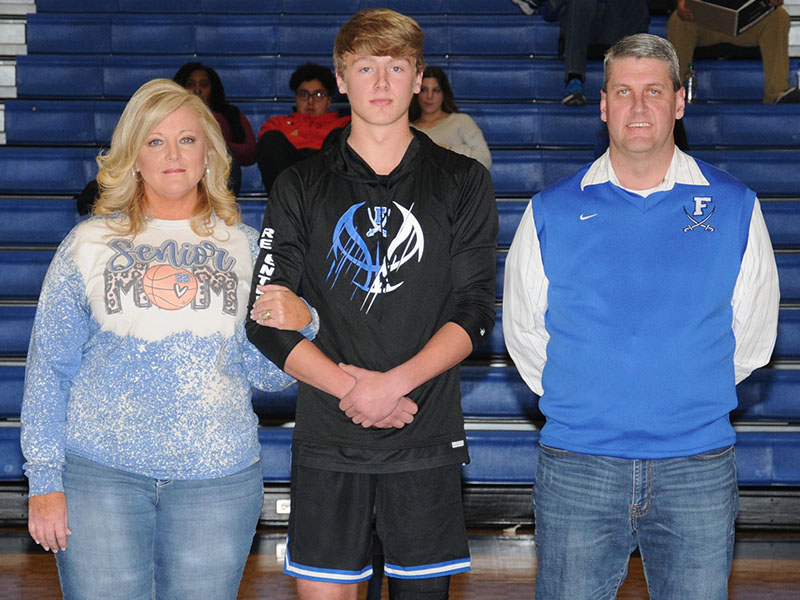 Landon Norton has played for the Fannin County Rebels for four years, three of those on the varsity basketball team. He was honored during Senior Night, Friday, January 7, at the Fannin High gym. Escorting him are his parents, Holly and Ryan Norton.