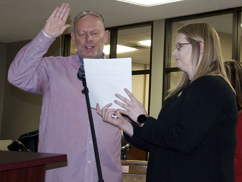 Blue Ridge Councilman Bill Bivins is shown giving his Oath of Office during the new administration’s first council meeting Tuesday, January 18. Beside Bivins is City Clerk Amy Mintz.