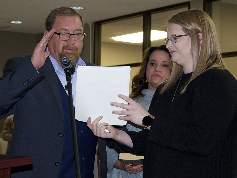 During the first official meeting of the new Blue Ridge council, the new members were sworn in. Giving his Oath of Office is Councilman Jack Taylor with Tonya Nuelle, middle, holding the bible and City Clerk Amy Mintz.