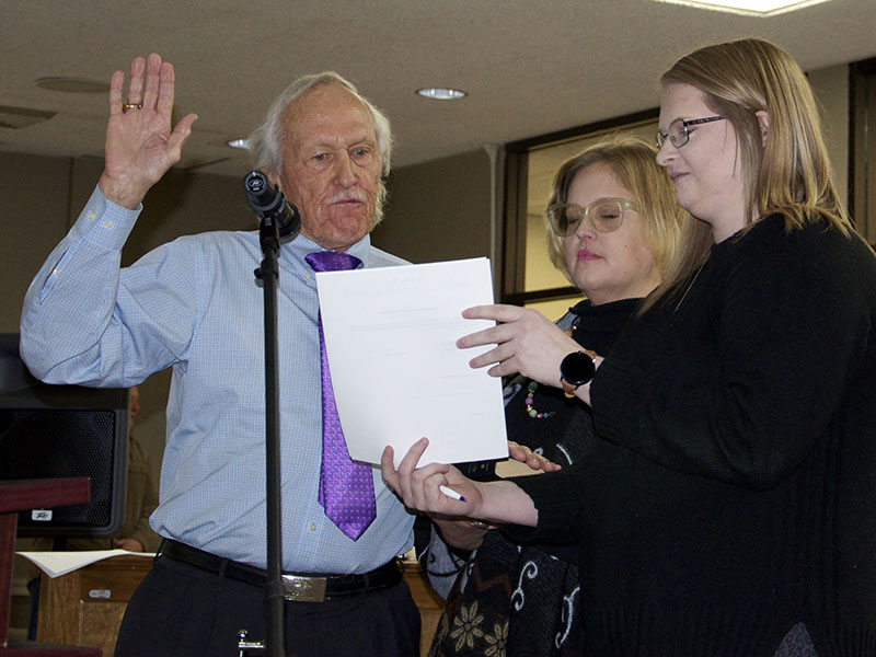 Dr. Bill Whaley is shown being sworn onto the Blue Ridge City Council during the council’s first meeting Tuesday, January 18. He is shown beside Allison Whaley, middle, and City Clerk Amy Mintz.