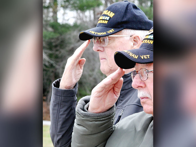 U.S. Army veteran Jerry Williams is shown saluting the American Flag during a Pearl Harbor Day ceremony in 2018.
