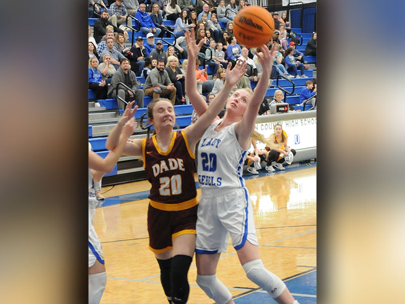 Lady Rebel Ava Queen fights for a rebound in last week’s Fannin County action.