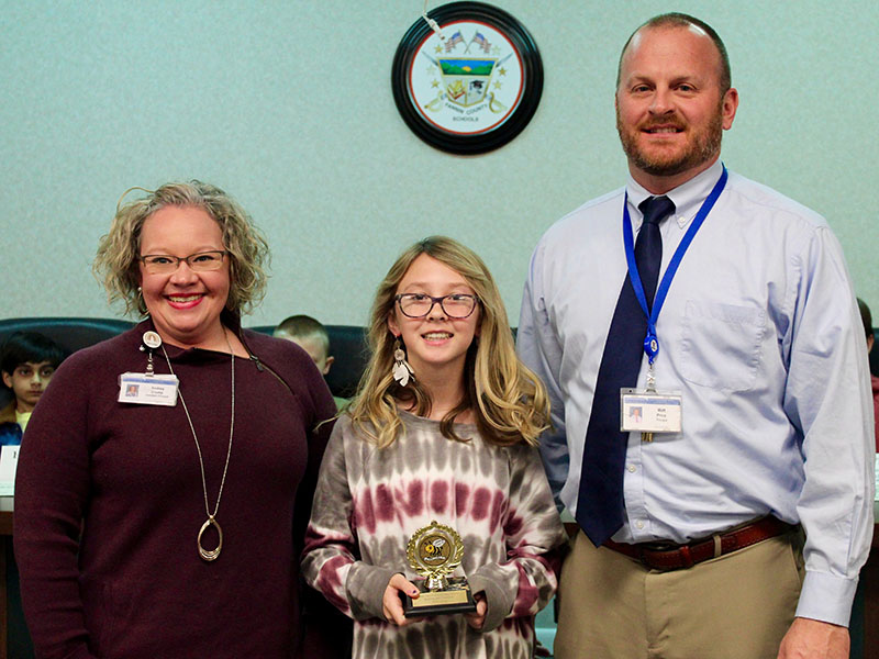 East Fannin Elementary School (EFES) fifth-grader Danica Nicholson, middle, was this year’s Fannin County School System’s Spelling Bee runner-up. Shown with her is, EFES Assistant Principal Andrea Crump and EFES Principal Mathew Price. 