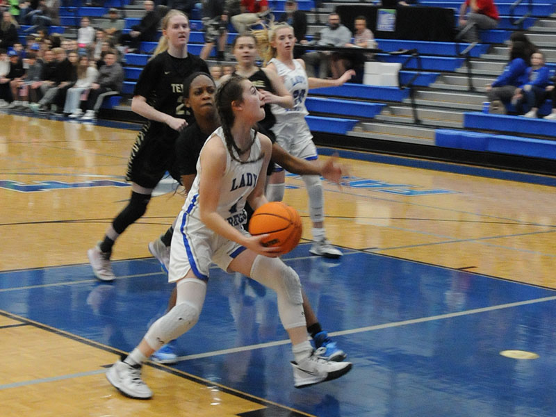 Courtney Davis drives the lane for Fannin County against Washington County. Davis challenged the inside defense of the visitors several times during the game.