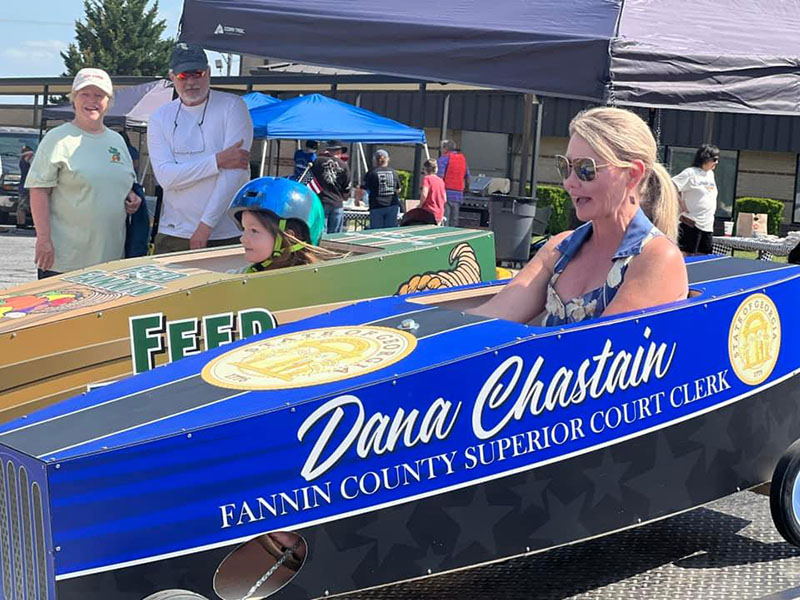When the Blue Ridge Soap Box Derby ran short of racers, Blue Ridge Mayor Rhonda Haight, in the Dana Chastain car, filled in to race against the Feed Fannin car she sponsored for the race.