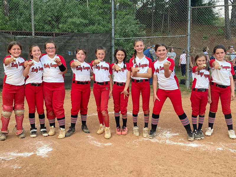 The Copper Basin 10Under girls finished their regular season in second place before taking first place in the Mountain Dizzy Dean Championship. The team included, from left, Madden Beach, Maleah Deal, Kinsley Ross, Kourtney Kraft, Kallie Mosley, Malaney Scoggins, Ayla Waters, Emma Sue Hughes, Kyleigh Boring, and Paisley Williams. The team’s coaches were Amanda Hyatt, Rodney Ross and Daniel Deal.