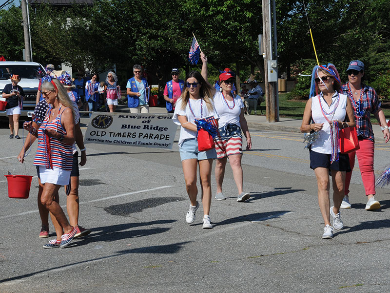 Various groups passed out treats to the children who lined the route for the Old Timers Parade July 4 through downtown Blue Ridge.