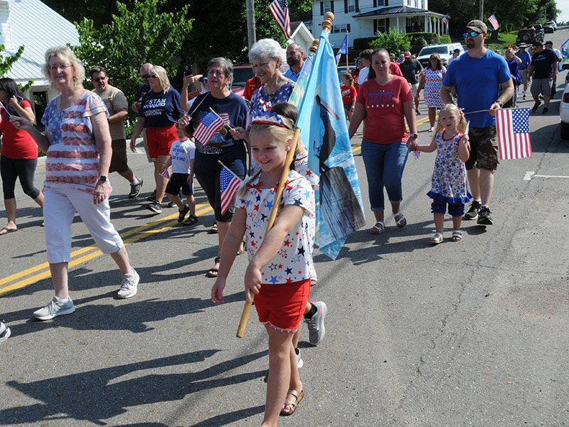 Children with flags filled the Walking Parade.  
