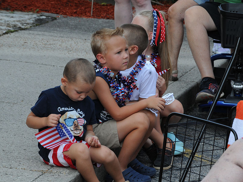 Children patiently waited for the all the activities planned for Ducktown after the Walking Parade.