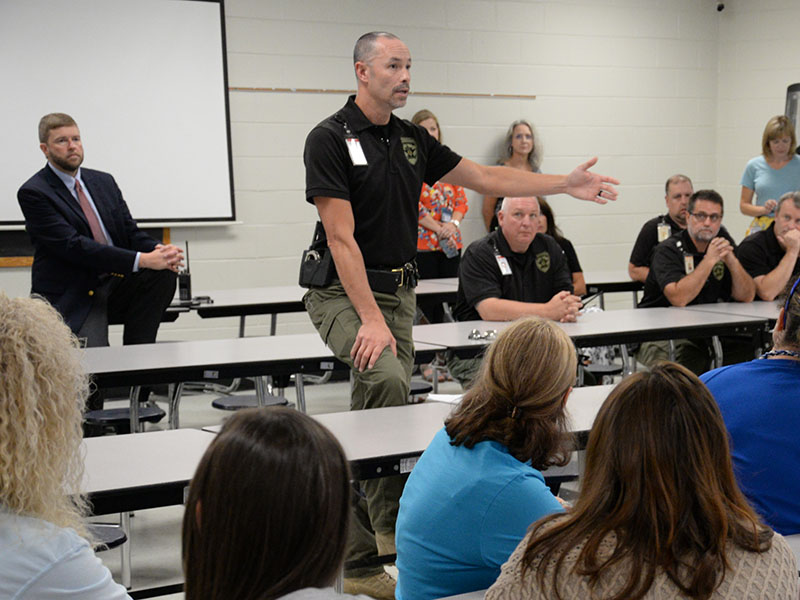 School Resource Officer Commander and Fannin County Deputy Sheriff Lieutenant Darvin Couch talks about the importance of training with Fannin County Middle School staff members last week. Couch spoke following an active shooter drill. In back at left is Superintendent of Schools Dr. Michael Gwatney who took part in the drill.