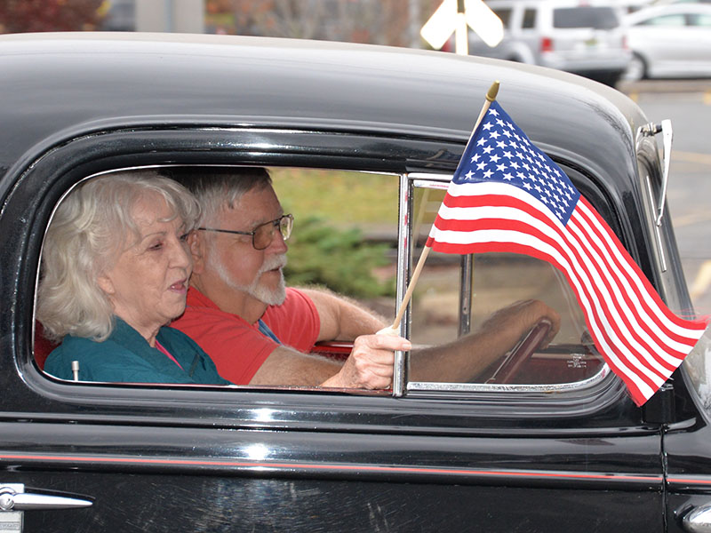 United States flags were plentiful during Saturday’s parade to honor Veterans Day.