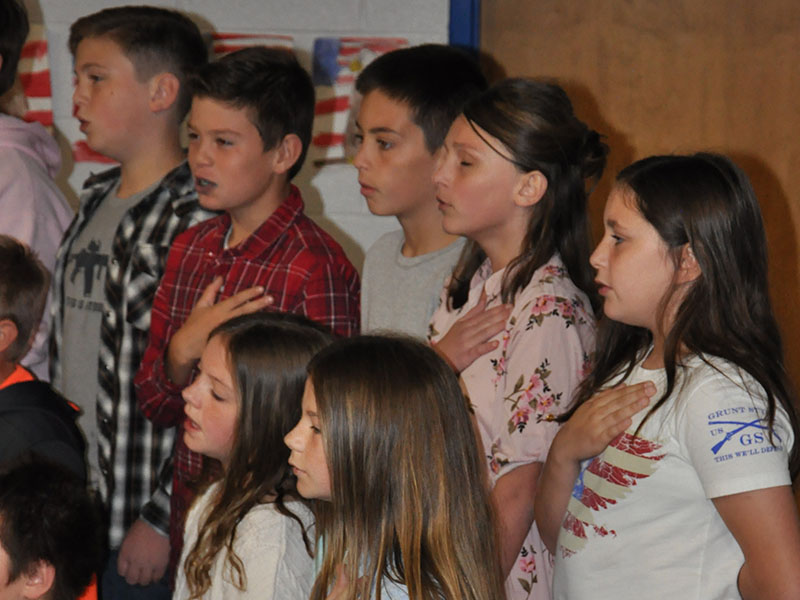 Pictured at East Fannin Elementary’s Veteran’s Day Program doing the Pledge of Allegiance are, from left, back row, William Powell, Clay Maddox, Wyatt Keleher, Bella Davenport and Bristol Falls. Bottom row, from left, are Lacey Hall and Sophie Price.