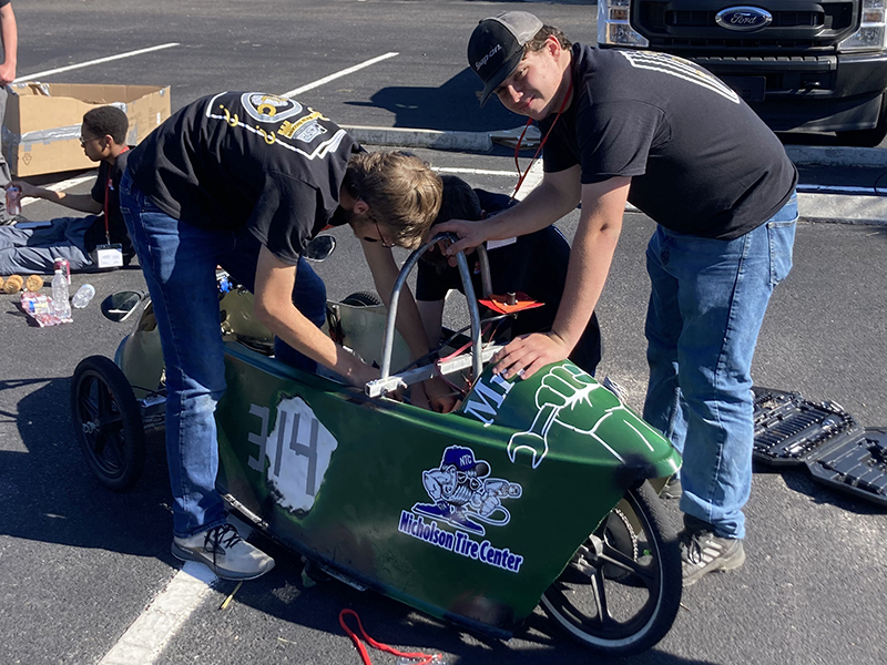 The Pit Crew for the electric car race, James Kyle, Luke Pelfrey, and Bryson Mitchell, were among the Fannin County High School and Fannin County Middle School Technology Student Association members who traveled to Jekyll Island for the TSA Fall Conference.
