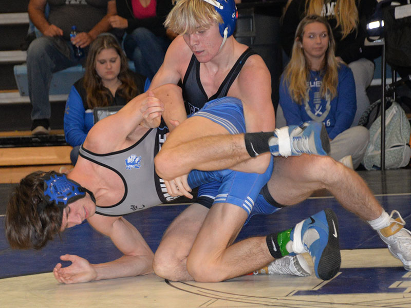 Blake Summers takes the upper ground in a recent match for the Rebels wrestling team. 