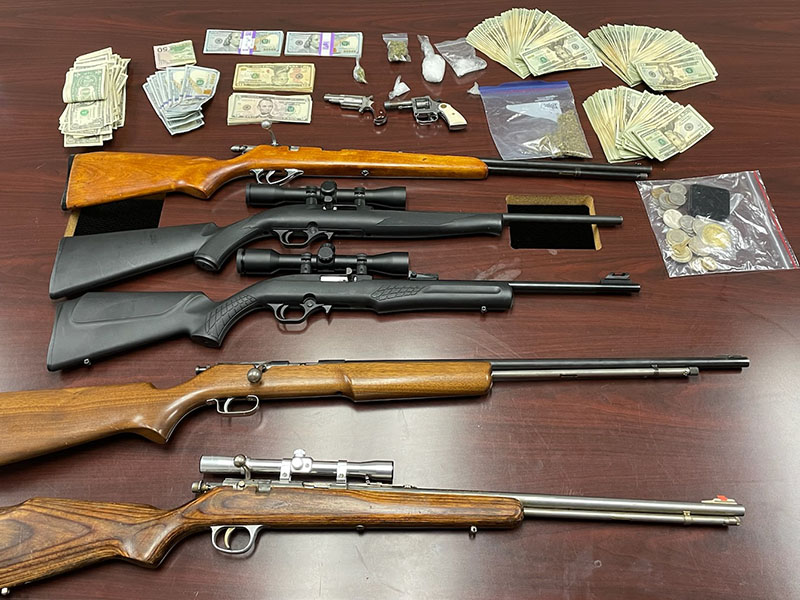 Approximately 50 grams of methamphetamine, an assortment of rifles and pistols, and $10,000 in U.S. currency were seized when a multi-agency law enforcement effort brought down a drug trafficking organization operating in the tri-state area.