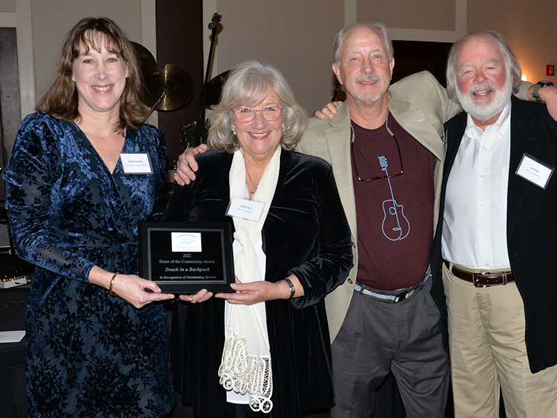 Snack in Backpack received the Chamber of Commerce Heart of the Community Award Saturday night. Manda Gwatney presented the award to Snack Executive Director Deby Beck, Greg Spencer and Carl Pruett. The organization has packed over one million backpacks filled with food for students.  