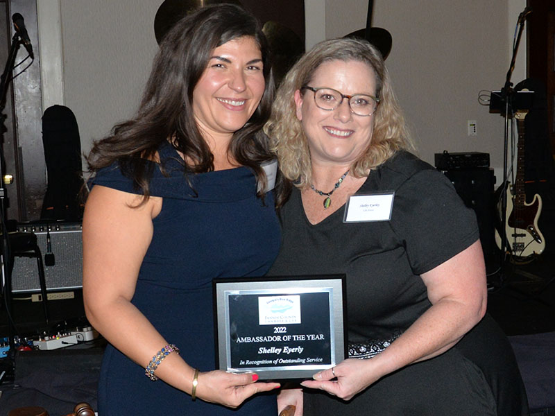 The Fannin County Chamber of Commerce Ambassador of the Year award went to Shelley Eyerly, right. It was presented by Chamber President Christie Gribble. The award recognizes the ambassador for involvement in Chamber events.